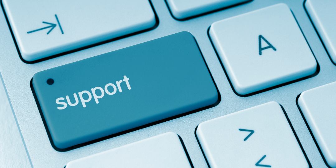 Close-up of a keyboard with a blue “Support” key, representing small business website support and technical assistance.